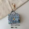 Moda Transfronteriza Mini Bolso Llavero Colgante Mochila Bolso de Mano Colgante Bolsa de Almacenamiento Billetera Bolsita para Auriculares Venta al por Mayor