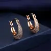 Pendientes de personalidad de moda europea y americana más vendidos de deseo transfronterizo con microincrustaciones de circonita, pendientes de temperamento para mujer, venta al por mayor