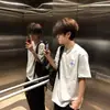 Novas Camisas Casuais Soltas de Manga Curta Bordadas Estilo Chinês Estilo Americano para Casais, Homens e Mulheres, Novas Blusas Estampadas de Manga Curta de Verão