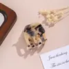Pinza de Garra Cuadrada Simple de Acetato Estilo Coreano para la Parte Posterior de la Cabeza Pasador de Tres Puntas Cola de Caballo Elegante Pinza Superior Accesorios para el Cabello Fabricante Mayorista