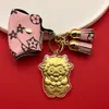 Ano do Carneiro: Uma coleção de chaveiros banhados a ouro, com fofos designs de ovelhas em desenho animado, perfeitos como presente de Ano Novo ou acessório para sua bolsa.