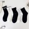 Calcetines para niñas Yishuangshuang, nuevos calcetines de otoño e invierno con forma de corazón de dibujos animados hasta la mitad de la pantorrilla, algodón peinado, calcetines estilo Miu con letras y caras sonrientes para estudiantes