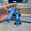 Llavero Creativo de Dibujos Animados Modelo de Carreras de Fórmula Colgante para Mochila Muñeca Exquisita Cadena para Llaves de Coche Pequeño Regalo
