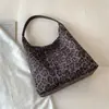 2026 Nuevo Bolso de Lona de Moda de Nicho Estampado de Leopardo Gran Capacidad Artístico Casual Versátil para Viajes Cotidianos Estilo Perezoso de Hombro Único