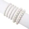 Pulsera con cuentas de perlas de imitación de vidrio estilo europeo y americano, pulsera de moda con temperamento de alta gama, cuerda elástica, pulsera multicapa