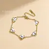 Pulseira Cruzada Simples de Trevo de Quatro Folhas Dupla Face Ouro 18K Não Desbota Joia de Moda Versátil Feminina Pulseira de Trevo da Sorte Venda por Atacado