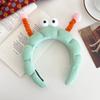 Diadema de peluche con ojos grandes para mujer, accesorio para el cabello con forma de palo giratorio, divertida y divertida, ideal para lavarse la cara.