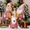 Decoraciones Navideñas en Stock Transfronterizas, Figuras Rosas de Papá Noel Sentado, Muñeco de Nieve y Reno, Decoraciones para Escaparates