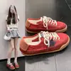 Tênis de treinamento alemão com bloqueio de cores de estrela de cinco pontas feminino novo estilo 2026 tênis esportivos retrô de estrela sapatos femininos versáteis casuais de sola plana