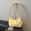 Bolso de axila de diseño nicho coreano para mujer, nuevo bolso versátil tipo dumpling de alta gama, bolso de mano y bolso de hombro