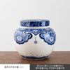 Tarro de té azul y blanco de cerámica mediano tarro sellado tarro de almacenamiento cubo de té vintage tarro de embalaje de té medio jin venta al por mayor