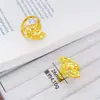Nuevo modelo de joyería de oro arena de la tienda de oro: Anillo de Pluma de Fénix Triple, un anillo abierto de moda, de lujo ligero y alta gama para mujer, adecuado para bodas
