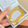 Pulsera de ágata amarillo natural con cuentas para mujer, accesorio cultural y creativo de bucle único de jade Hetian, ágata amarillo al estilo chino. El robo de imágenes será procesado