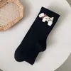 2024 nuevos pantimedias para niños pajarita perros niñas leggings de algodón primavera y otoño calcetines de bebé al por mayor