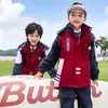 Chamarra nueva de uniforme escolar para exteriores, uniforme de clase para estudiantes de jardín de infantes, primaria y secundaria, chamarra roja de dos piezas desmontable
