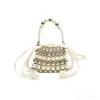 Bolsa Infantil 2026 Estilo Nuevo Hecha a Mano con Perlas Bolso de Mano Socialite Pequeño Estilo Chanel Perlas Bolso Cruzado para Niñas Padre-Hijo para Exportación