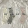 Calcetines cortos color blanco leche para mujer, dulce lazo, calcetines hasta la pantorrilla, estilo fino de verano, deseo puro, borde enrollado, calcetines calados, calcetines deportivos de tenis para mujer