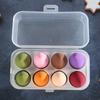 Venta al por mayor de huevos de belleza, no coma polvo cuando el agua se vuelva más grande, borla para polvos húmeda y seca, borla para polvos de doble uso, traje de huevo de maquillaje, venta al por mayor de huevos de belleza