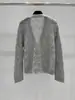BORBOTIE Ropa de punto para mujer 2026 Producto nuevo Primavera y Otoño BC Hueco Cuello en V Patrón de hojas Cardigan casual holgado