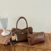 Bolsa modelo novo 2026 transfronteiriça, bolsa de mão simples estilo coreano, bolsa de balde fashion de grande capacidade, bolsa transversal casual para o dia a dia