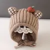 Bonitos y adorables gorros de otoño e invierno para niños, con diseño de poner, material de punto y una serie de dibujos animados, que brindan abrigo y protección para los oídos para bebés y niños pequeños.
