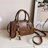 Bolso tipo almohada de mano de alta gama a la moda 2026 otoño transfronterizo nuevo bolso de hombro casual simple bolso cruzado de moda para el día a día