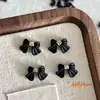 Acessórios Clássicos de Nail Art Preto Estrela Explosão Laço Tendência Laço Flutuante Decorações de Nail Art Acessórios