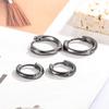 Mobius negro pistola negro liso arete de círculo liso para hombre y mujer tendencia simple moda rufián guapo hebilla de oreja personalidad única