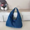 Bolsa Tote de Ombro Feminina em Sarja 2026 Nova Primavera Verão Casual Versátil Retrô Grande Capacidade para o Dia a Dia