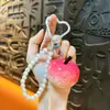 Chaveiro de Pérola Laranja com Contas, Único e Estiloso, Pingente de Corrente para Celular de Moda de Nicho, Acessório Fresco e Versátil Atacado