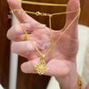 Tienda de oro Puzuo con accesorios de oro DIY, collar con colgante de cruz de diamantes completos, vajra, cadena para clavícula de lujo ligero que combina con todo
