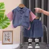 Comercio Exterior Niños Verano Nuevo Camisa de Mezclilla a Cuadros con Solapa Ropa Infantil Manga Corta Pantalones Cortos Traje Infantil 2025 Conjunto de Dos Piezas