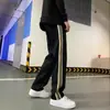 Pantalones Casuales Negros Estilo Americano para Hombre 2026 Nueva Moda Trendy para Hombre Versátil Holgado Talla Grande Estudiante Pierna Recta Pantalones Deportivos