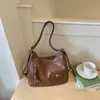Moda para o Trajeto Verão 2026 Uma Alça Grande Capacidade Nova Bolsa Transversal Casual Retrô Mochila Feminina
