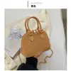 Bolso de Mano de Color Sólido a la Moda con Perlas para Mujer 2023 Venta Caliente Transfronteriza Bolso de Mujer de Moda Tendencia Elegante Versátil