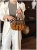 Bolsa de axila de camurça de grande capacidade estilo coreano para mulheres, nova coleção 2026, bolsa de mão plissada com laço de ombro único, bolsa de ombro moderna para o dia a dia
