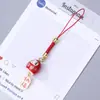 Llavero de cuentas producto terminado, colgante para correa de teléfono de gato de la suerte Daruma de cerámica, cordón colorido, duradero y resistente, decoración de regalo