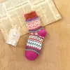 Outono e inverno Novos meias grossas quentes femininas de lã de coelho meias literárias étnicas de caxemira mulheres fabricantes atacado