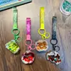 Chaveiro de fruta com óleo líquido, pingente de chaveiro divertido com areia movediça líquida, acessório de bolsa, pequeno presente para máquinas de venda automática, atacado