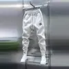 Novas calças de moletom estilo harém de cor sólida, calças justas, bordado punk, roupas masculinas estilosas, calças masculinas de alta qualidade, calça jogger masculina