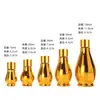 Botella de aceite esencial dorada galvanizada, botella de vidrio a prueba de luz con gotero de calabaza simple, botella rociadora de perfume, botella de muestra de viaje para cosméticos