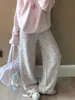 Calça feminina xadrez pied-de-poule de perna larga, coleção outono/inverno 2026, cintura alta, corte reto relaxado, forrada com fleece, calça de lã xadrez branca