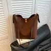 Bolso tipo cubo otoño e invierno, gamuza retro, bolso tote de gran capacidad para mujer, nuevo estilo 2026, versátil bolso de hombro y bolso cruzado