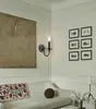 Lámpara de pared de vela retro, lámpara de pared candelabro de hierro forjado estilo campo americano, lámpara de mesita de noche estilo europeo para dormitorio, iluminación de pasillo o recibidor, adecuada para crear un ambiente acogedor en una casa de huéspedes