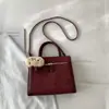 Bolso Tote Retro Versátil Transfronterizo para Viajes Diarios de Mujer Modelo Nuevo 2026 Bolso de Hombro/Axila de Gamuza de Gama Alta de Nicho