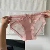 Nova Tanga Sexy Estilo Menina Francesa com Laço de Renda Vazada Pura Desejo Confortável de Malha e Cetim Respirável