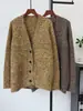 Suéter abrigo largo de punto casual retro holgado adelgazante de otoño e invierno 2026 nuevo cárdigan de punto versátil con cuello en V para mujer