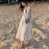 Vestido Branco com Suspensório Patchwork para Mulheres 2025 Verão Novo Estilo High-End Elegante Aparência Afinando a Cintura Saia Longa Texturizada