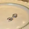 Pendientes de color diamante de alta gama 925 para mujer, estilo dulce fresco, nicho, ins, pendientes de temperamento, pendientes con juego de circonitas de cobre, venta al por mayor
