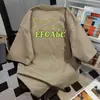 Camiseta de Manga Corta con Estampado de Letras de Diseño de Alta Gama 2025 Nuevo Estilo de Verano Oversize Estilo Pareja Ropa de Trabajo Superior